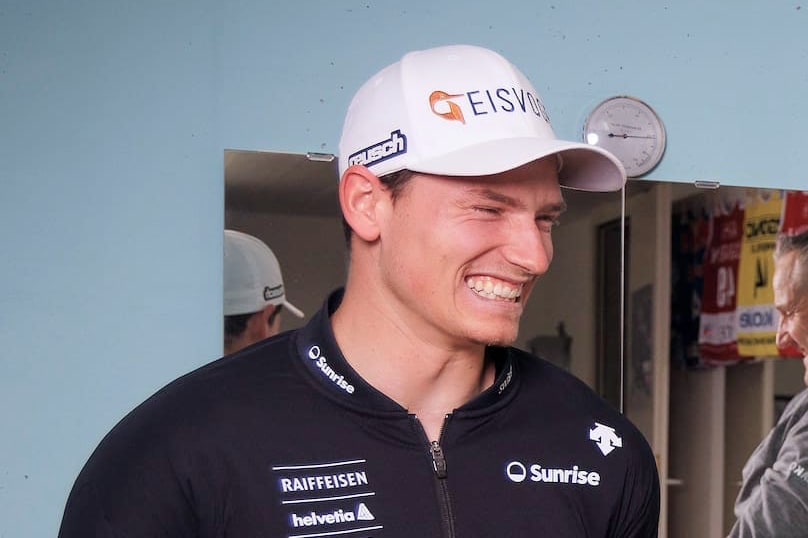 Thomas Loeffer in a gym, grinning